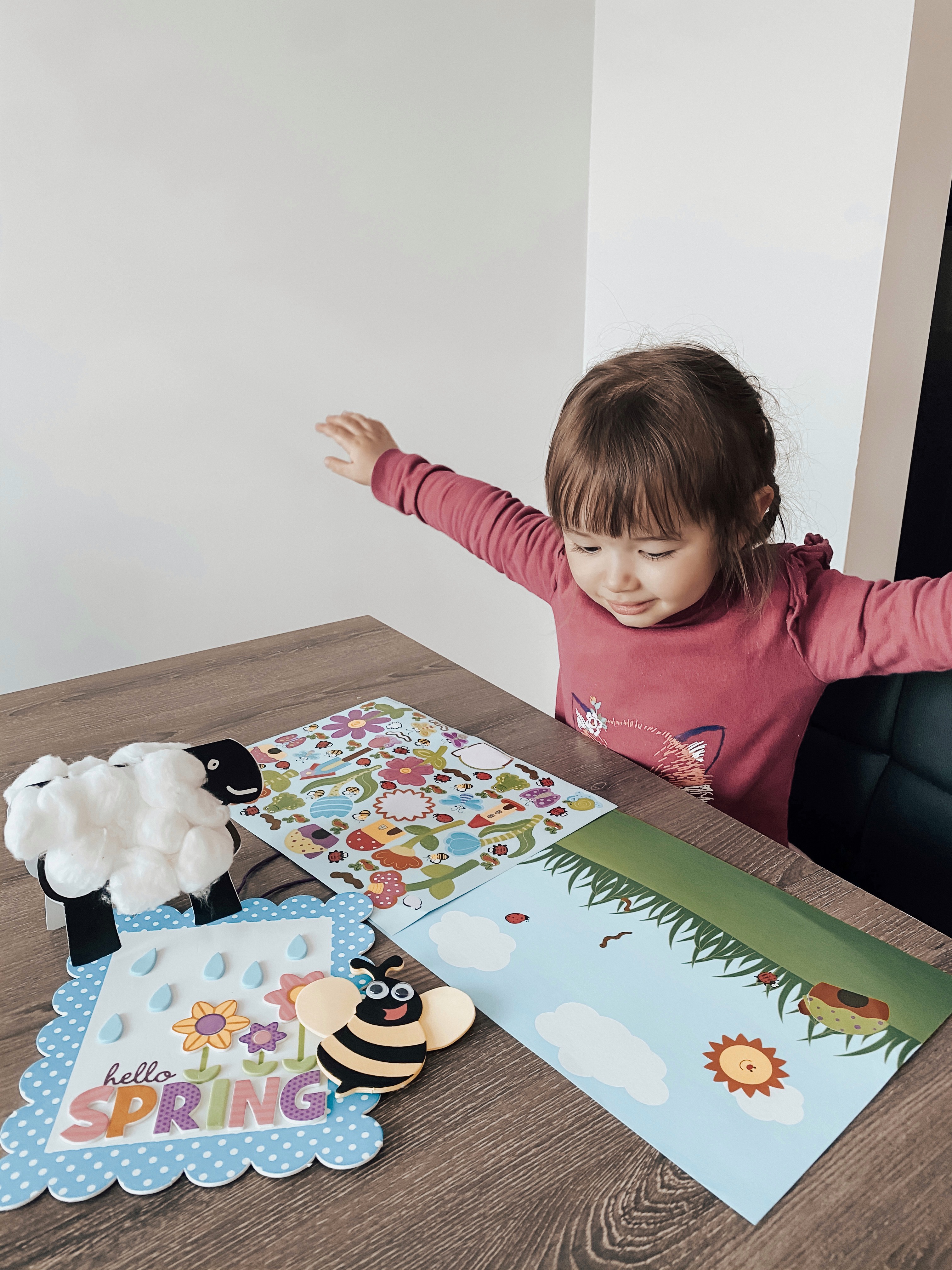 Kids doing spring sticker activities