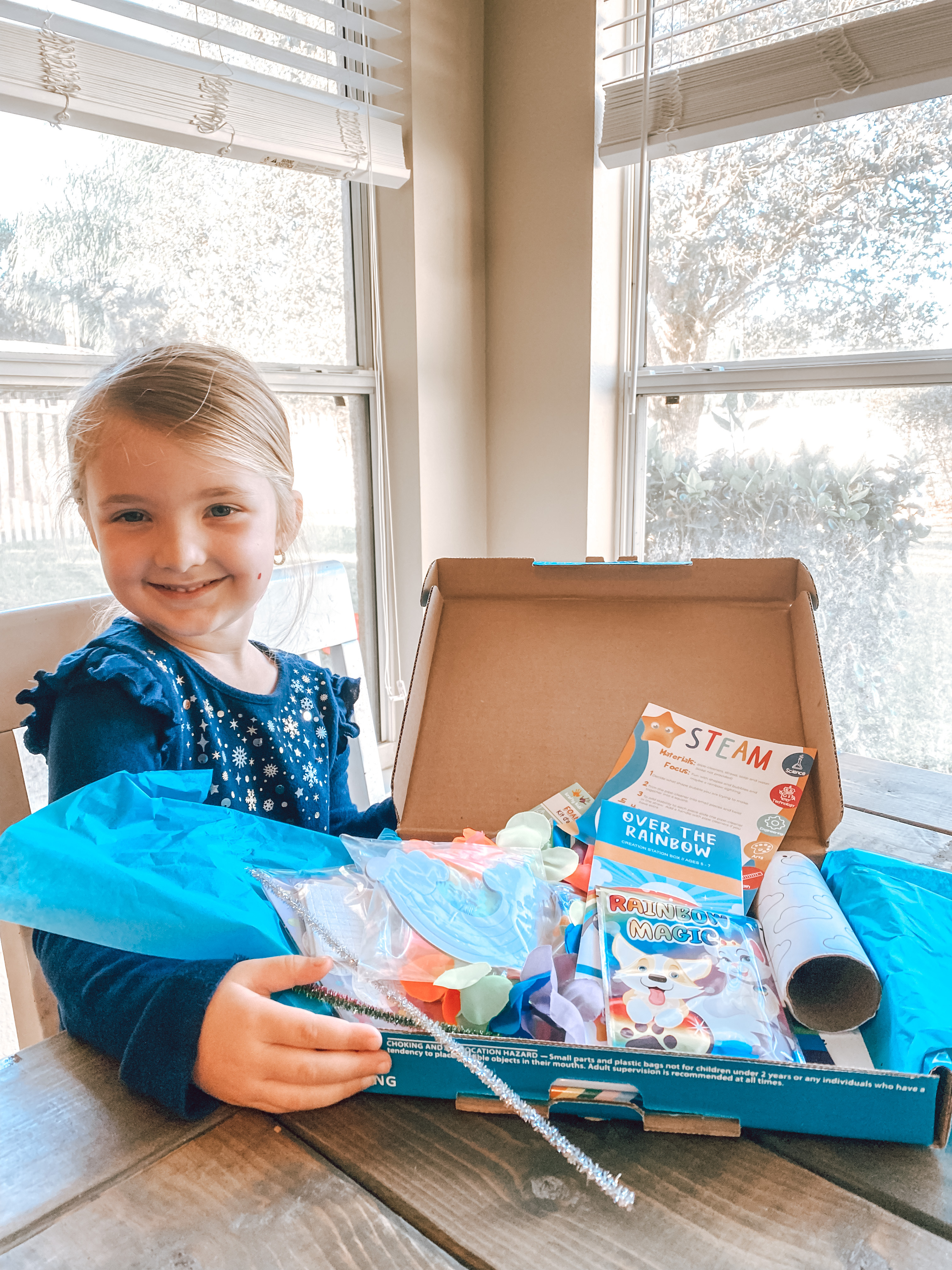 Girl with summer craft project outdoors