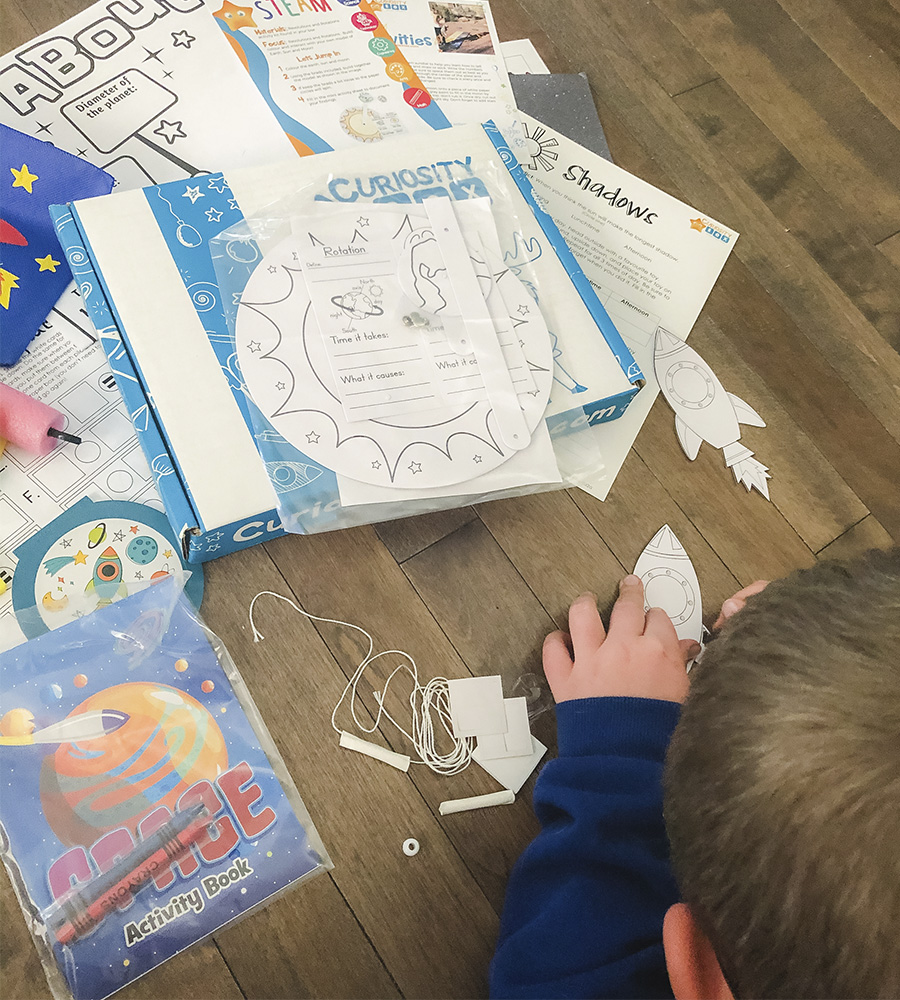 Kids opening summer craft box