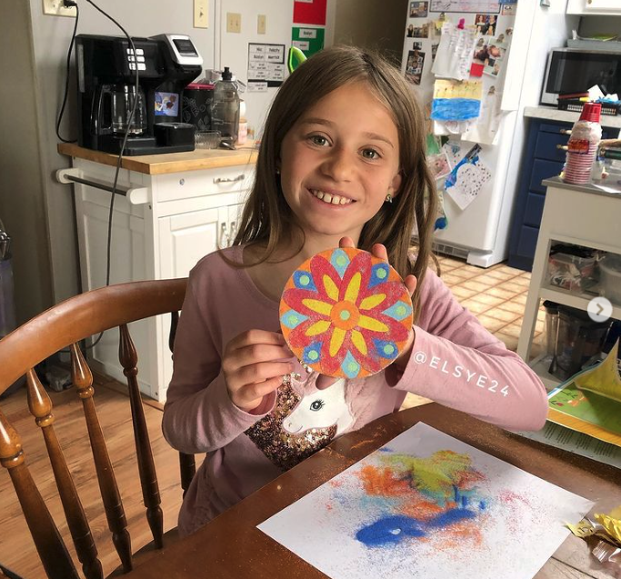 Girl crafting summer themed art