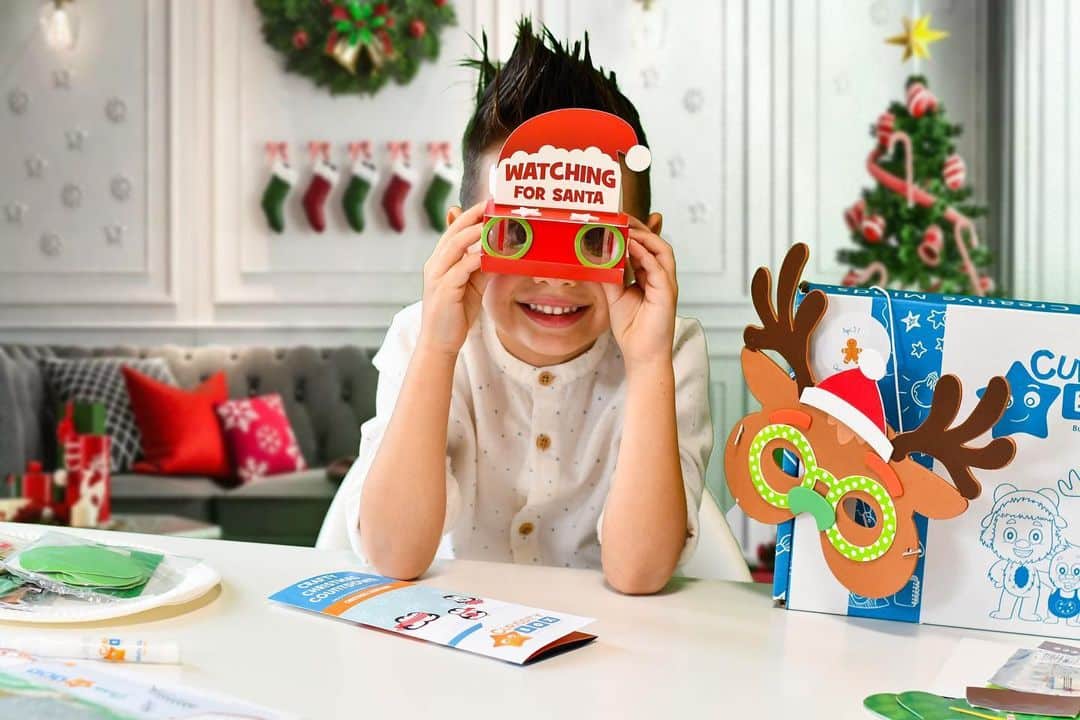 Kids excited about Christmas craft box