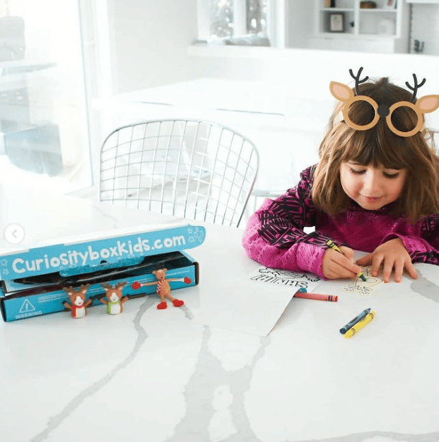 Girl making holiday craft projects